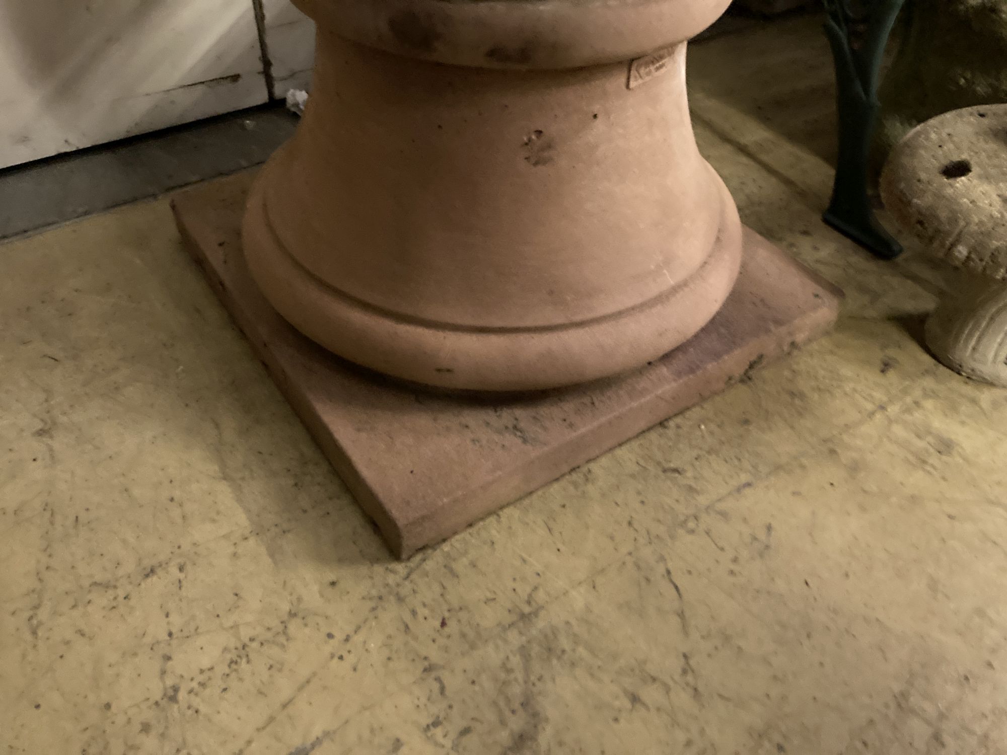 A large circular terracotta planter on base, named Kinsman, 70cm diameter, height 68cm